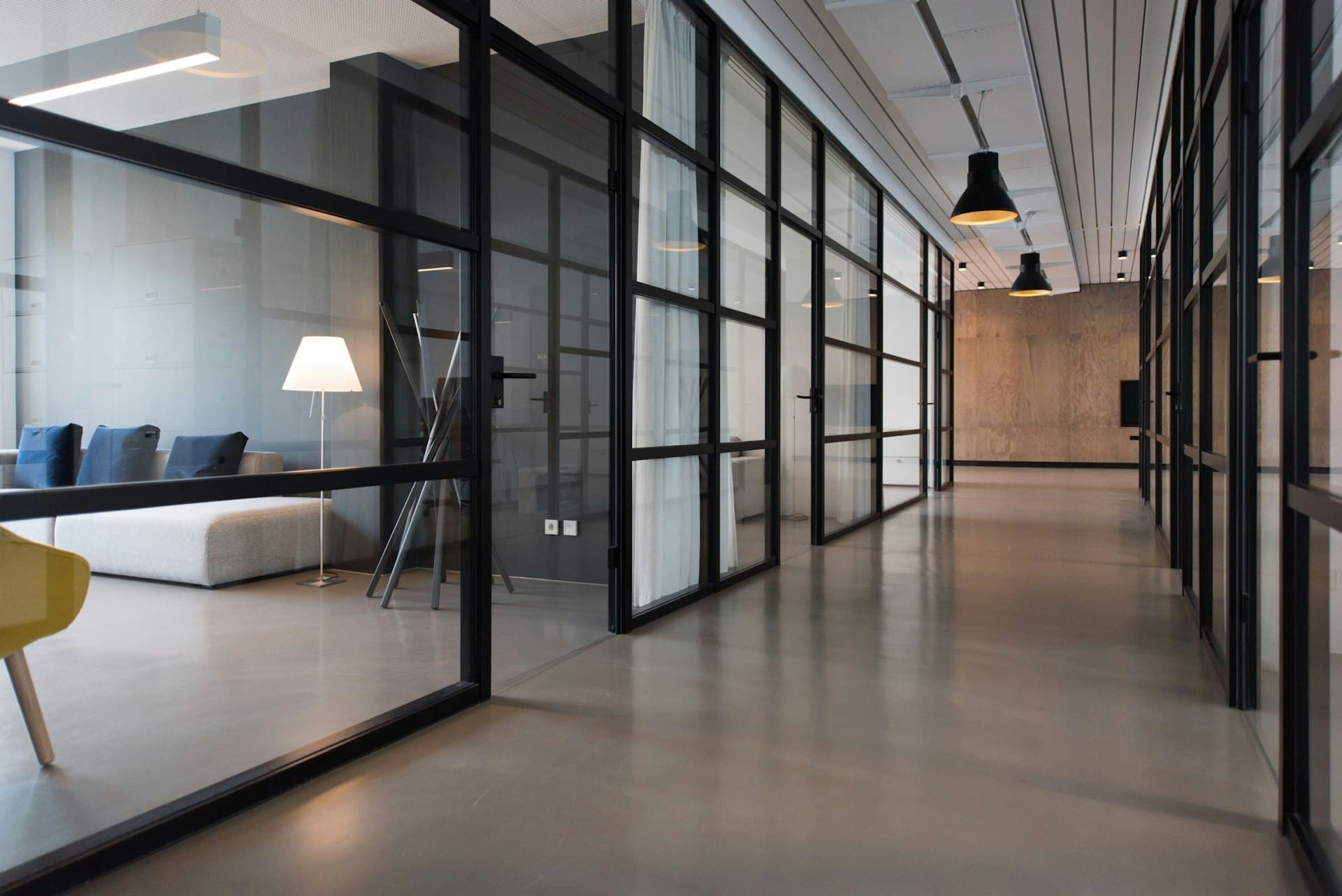 A considered advisory conversation in a warm modern boardroom